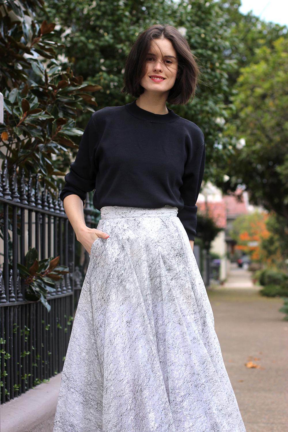 Chloe Hill wearing Maticevski full midi skirt and super youth black knit sweater on the streets of sydney