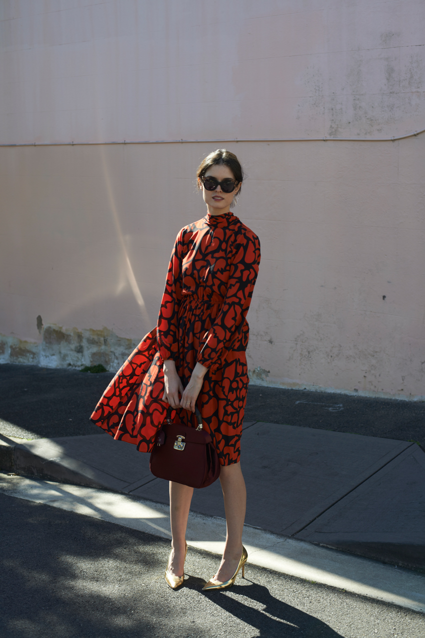 CHLOE-CHILL-SYDNEY-FASHION-BLOG-Chloe-Hill-wearing-Romance-Was-Born-heart-print-dress-and-manolo-blahnik-gold-heels