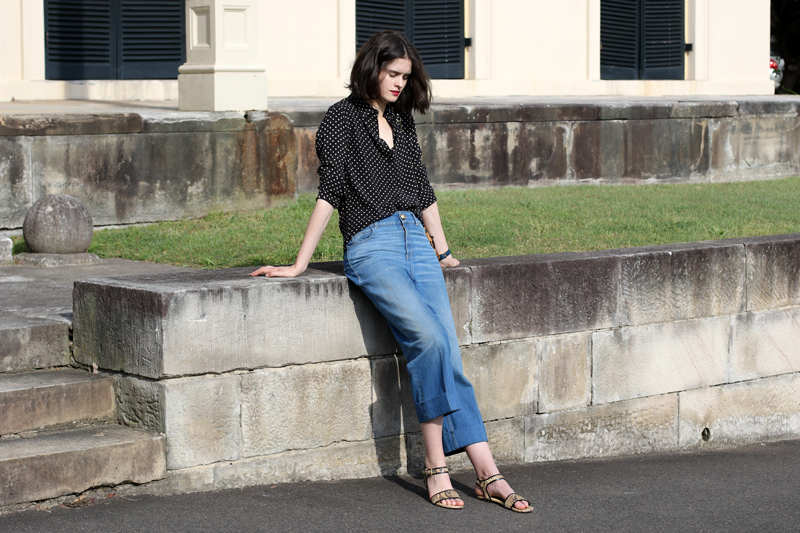 Chloe-C-Hill-wearing-the-fable-spotted-silk-shirt,-gucci-wide-leg-jeans-and-marni-python-sandals