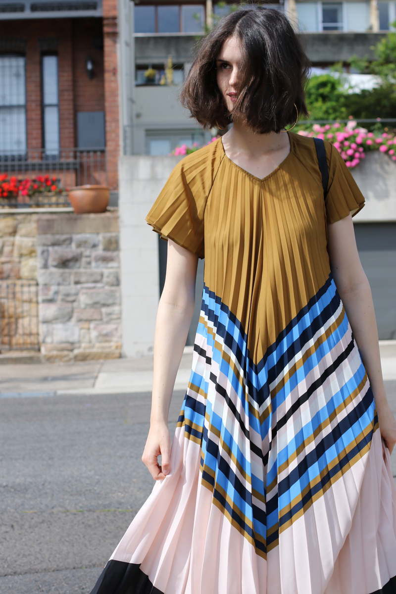 Chloe-Hill-Wearing-Zimmermann-blue-and-brown-striped-pleated-shift-dress