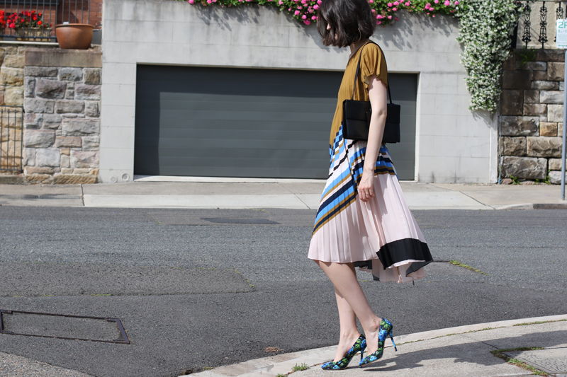 Chloe-Hill-Wearing-Zimmermann-stripe-pleat-dress-and-Miu-Miu-Floral-Heels,-Gucci-vintage-black-shoulder-bag-on-the-streets-of-Sydney,Australia-