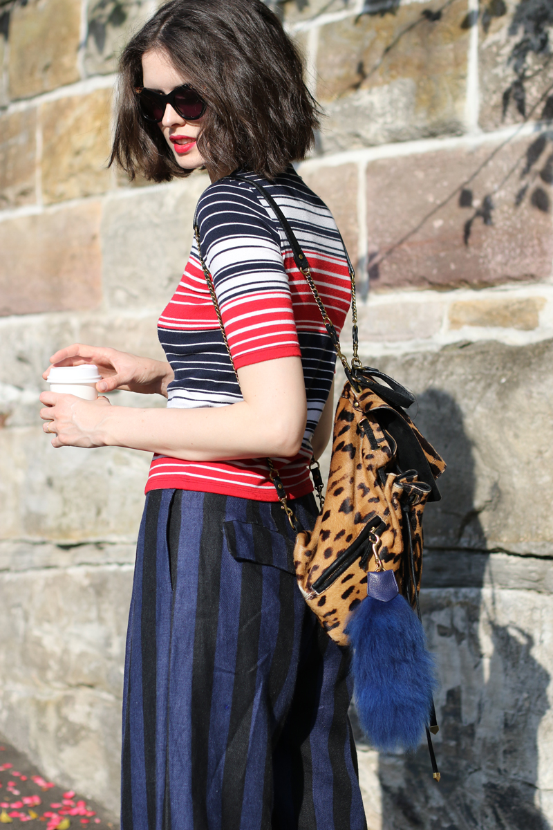 Chloe-Hill-Wearing-top-shop-stripe-tshirt,-lee-mathews-striped-culottes,-Jerome-dreyfuss-leopard-backpack-and-deadly-ponies-bag-charm