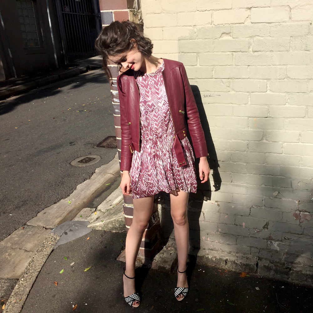 Chloe-Hill-Wearing-Iro-Australia-printed-dress-and-burgundy-leather-jacket-from-their-end-of-season-sale