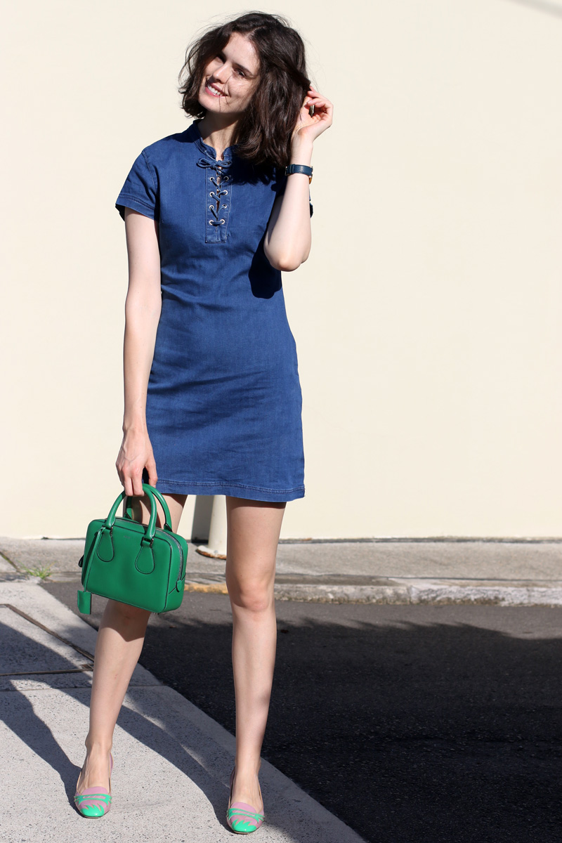 Chloe-Hill--wearing-Misguided-lace-up-denim-dress,-Bally-green-mini-top-handle-bag,-Bottega-Veneta-pink-and-green-shoes-in-Sydney